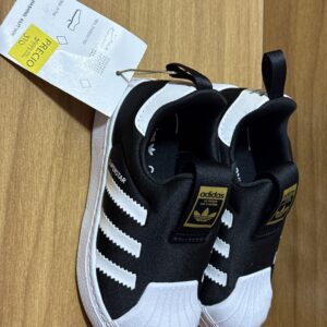 Tenis de marca mixto $999 370