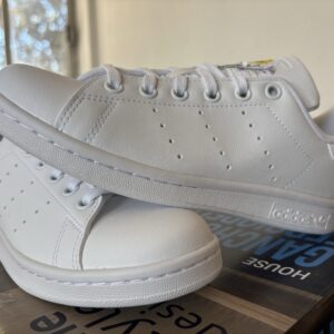 Tenis de marca mixto $999 575