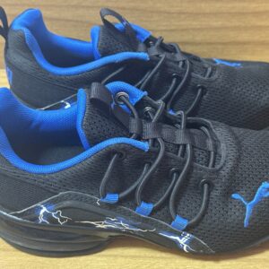 Tenis Skechers negro/azul niño $999 615